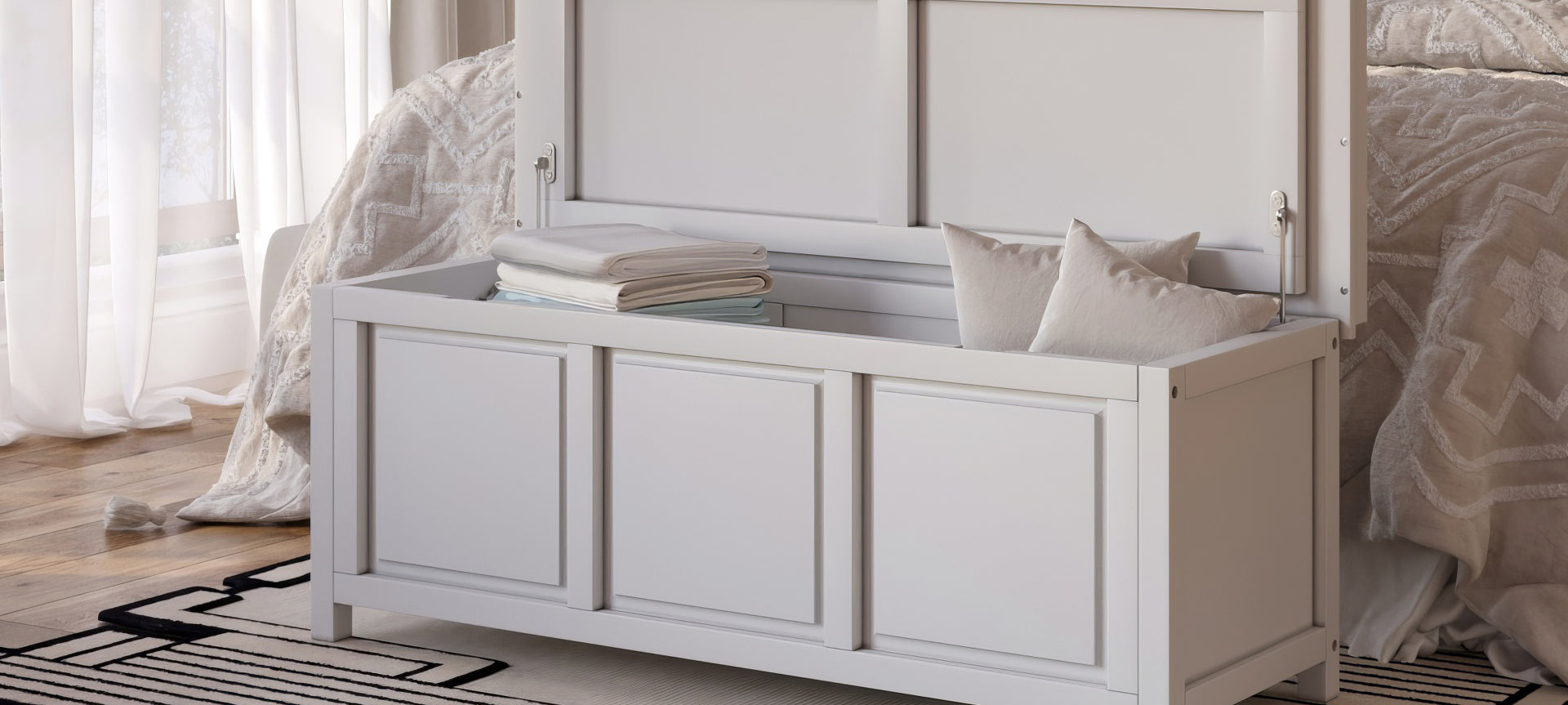 closeup of open storage chest in bedroom