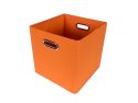 3/4 view of square orange canvas storage bin with chrome handle on white background