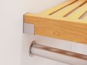 Close up of John Louis Home garment bar and bar end hardware on closet organizer with 4 drawers