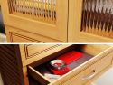 Close up of the John Louis Home glass doors and shelf tower on closet organizer with 5 drawers and glass doors