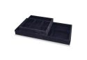 An empty 12 inch deep black velvet John Louis Home Half size jewelry organizer tray sitting on top of an empty full size jewelry tray displaying various sized compartments on a white background.