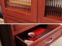 Close up of the John Louis Home glass doors and shelf tower on closet organizer with 3 drawers and glass doors