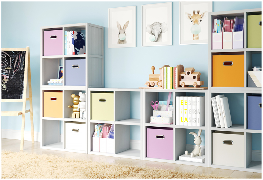 Image of a child's room with white John Louis Home cube storage unit. The unit has four tiers of three cubes each with storage bins.