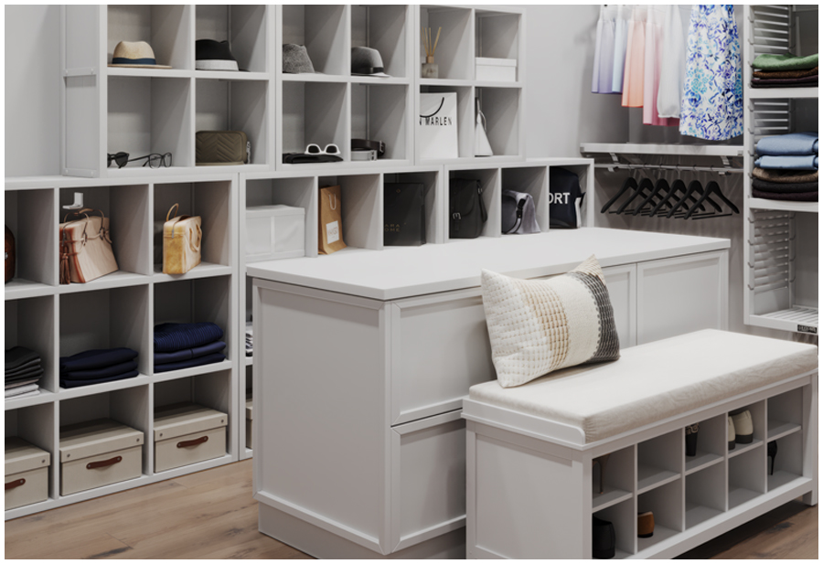 Image of a walk-in closet with a white bench and shelf system