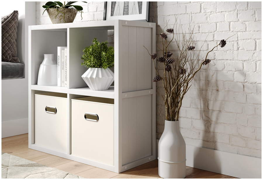 Image of a suare 4 cube storage unit with decor items and fabric bins in a entryway