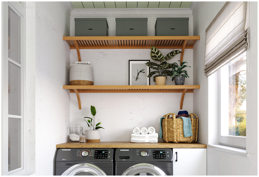 A laundry room with a front-loading washing machine and dryer. There are solid wood John Louis shelves with cleaning supplies above the machines